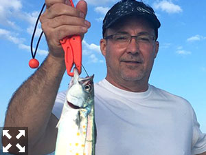 Pat Patterson of Houston, TX with a nice Spanish mackerel.
