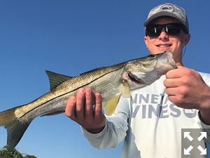 Aidan hooked up with a snook at our first spot.