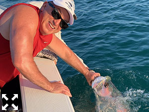 David Miller with a Tarpon he battled, caught, and released.