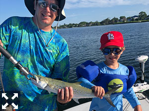 Five-year-old Henry and his dad Ben had a little fishing contest.